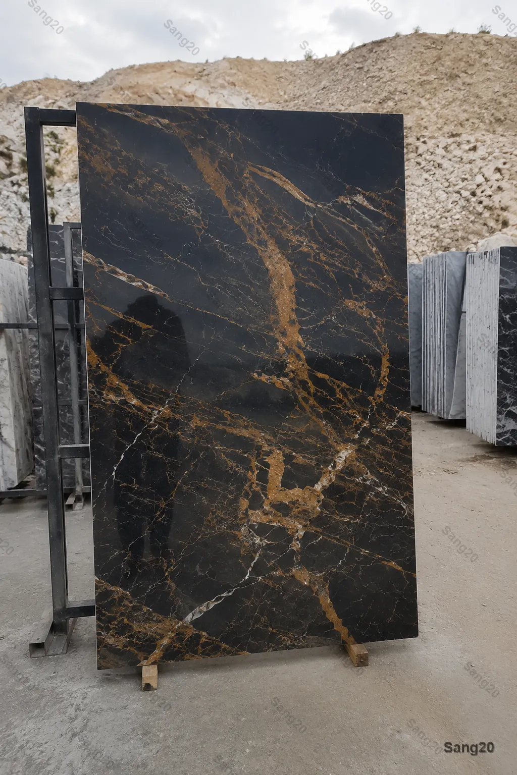 Golden Black marble slab, quarry sample 2, with black background and gold-white veins